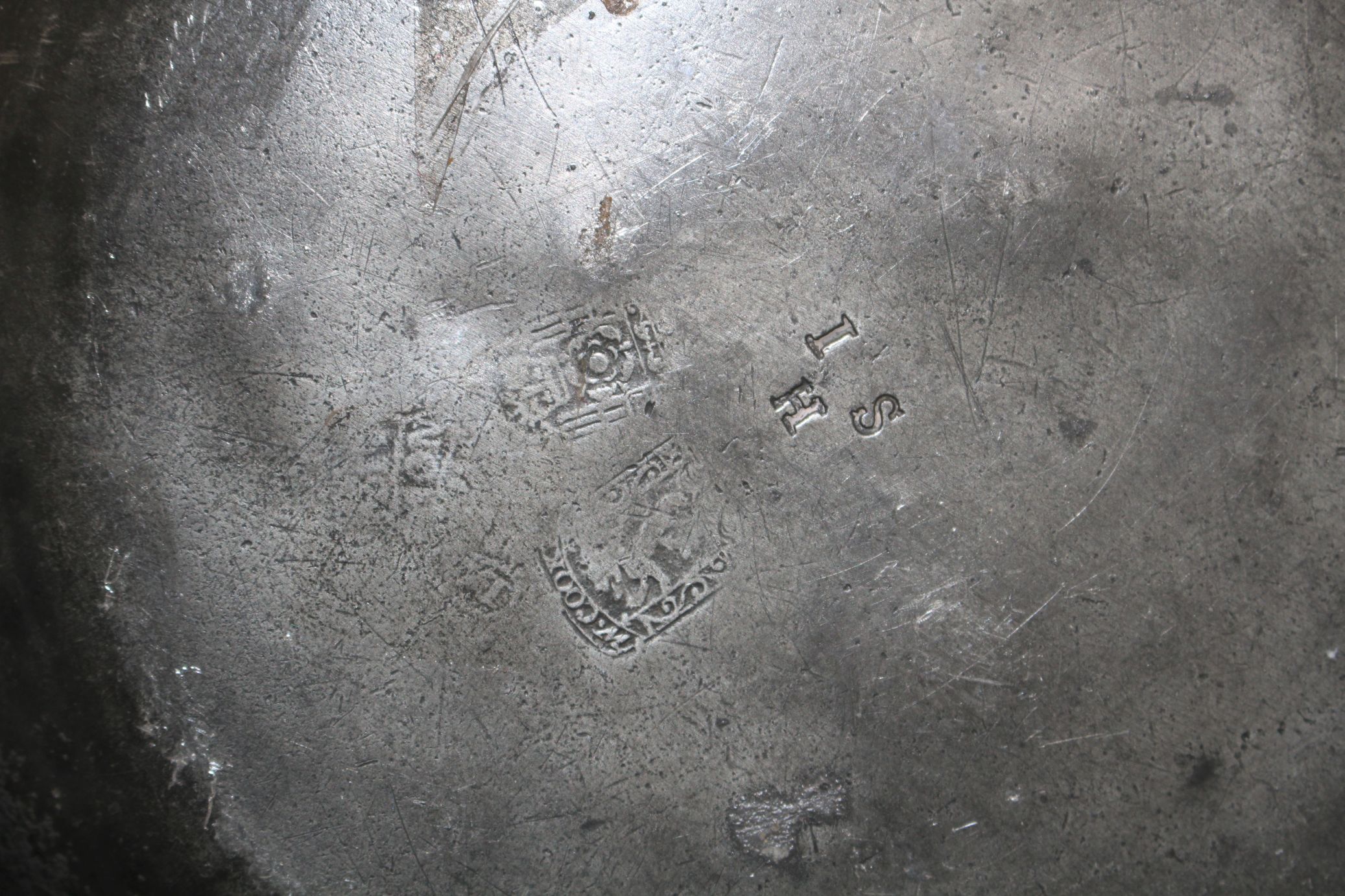 A George III pewter charger by William Hogg of Newcastle, diameter 34cm and a dished plate 27cm - Image 4 of 5