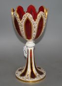 A 19th century Bohemian overlaid ruby glass goblet vase, height 32cm Condition: Broken completely