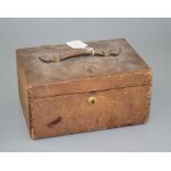 An Asprey of London leather jewellery box, with two interior trays and carrying handle, width, 25.