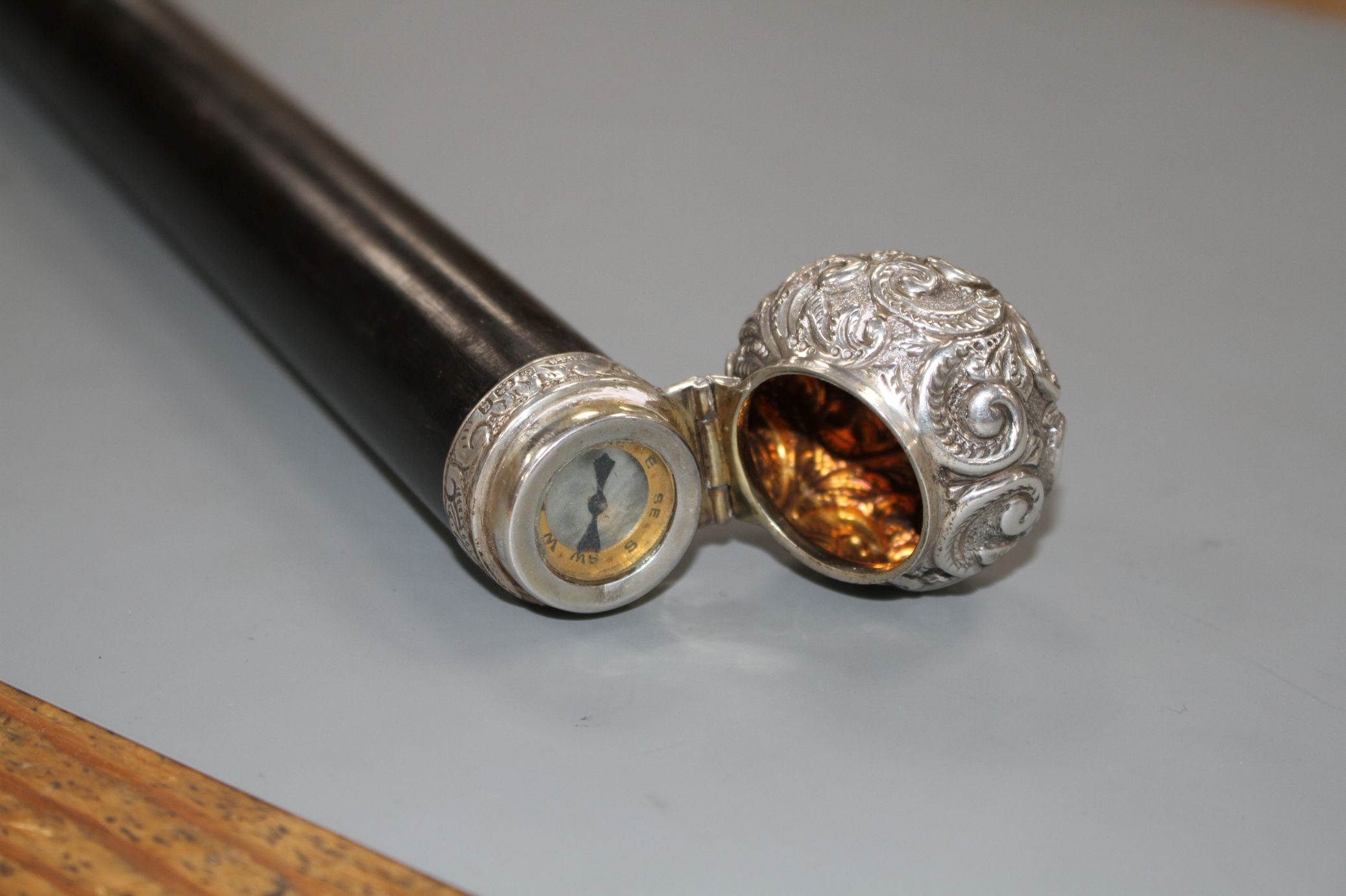 A Victorian walking stick with embossed silver pommel H.M., Birmingham 1906, opens to reveal a - Image 6 of 10