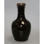 A Chinese dark brown glazed baluster vase, height 31cm Condition: Firing flaws particularly one