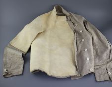 A late 19th century linen fencing jacket, with suede leather protect for body and arm for right