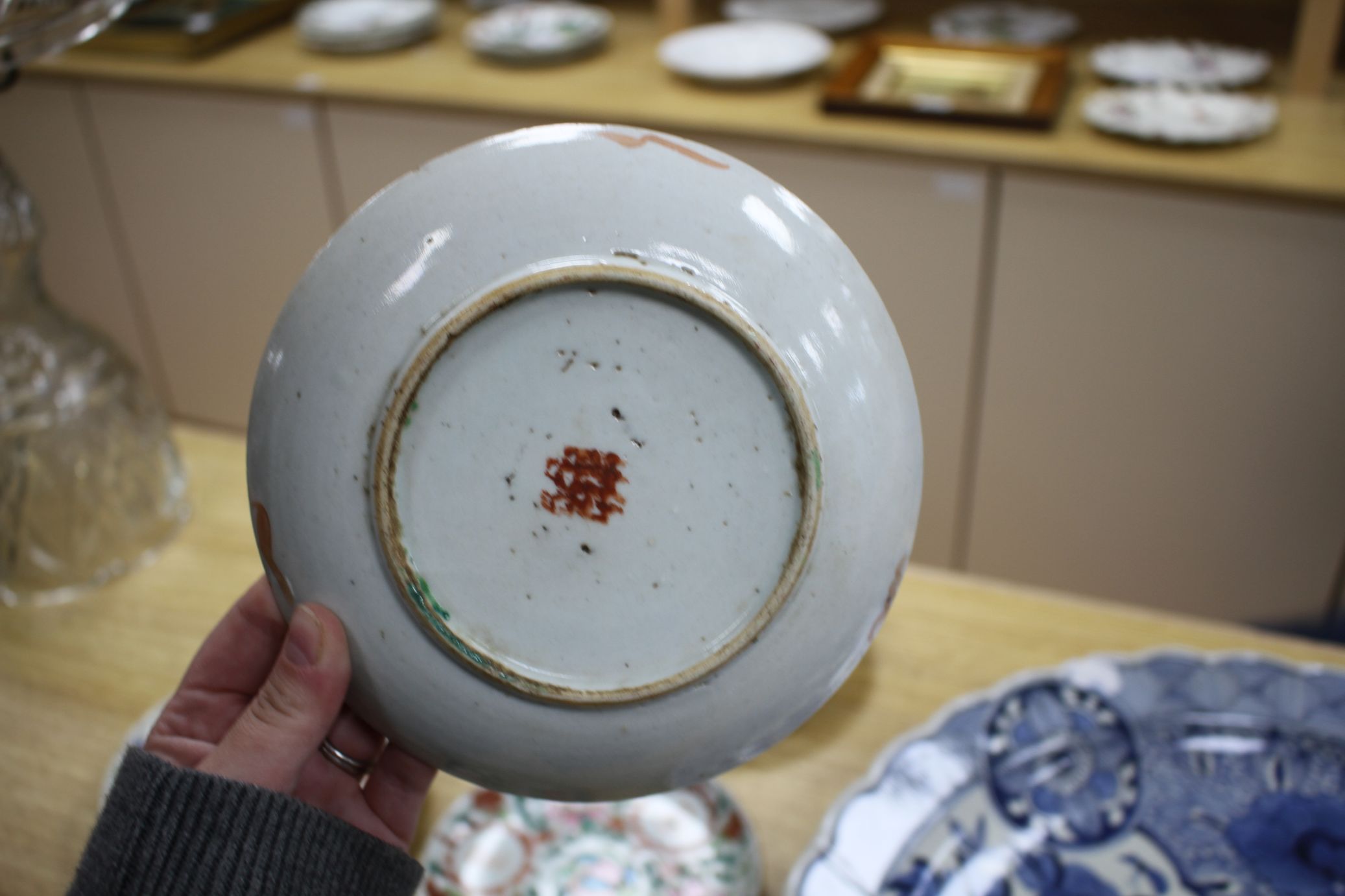 A near set of six 19th century Chinese famille rose saucer dishes, each painted with fruit and - Image 6 of 6