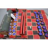 A 19th century Jaques Patent portable 'B.C.D.' backgammon, chess and draughts board set, the gilt