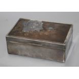 A Japanese silver, copper and gold cigarette box, Meiji period, decorated with a panel of roses,