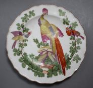 A Chelsea 'exotic bird' plate, c.1758-60, red anchor mark, 21.5cm Condition: Minor wear and black