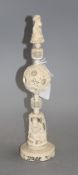 A 19th century Chinese carved ivory concentric ball on stand, height 35cm Condition: Hairline