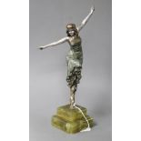 An Art Deco silvered bronze figure of a dancing girl, Paul Phillipe, on signed onyx plinth, height