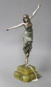 An Art Deco silvered bronze figure of a dancing girl, Paul Phillipe, on signed onyx plinth, height