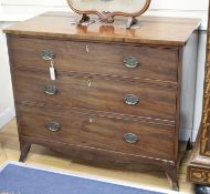 A Regency mahogany chest of three long drawers, W.108cm D.56cm H.89cm Condition: Overall of fairly