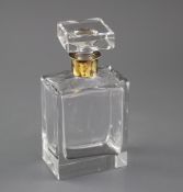 A 1970's silver gilt collared glass rectangular decanter and stopper, marks rubbed, London, 1974,