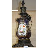 A 19th century French bronze mounted porcelain lamp base, painted with panels of flowers, height