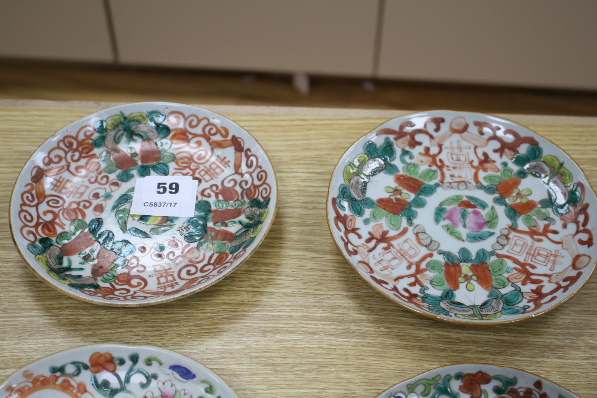 A near set of six 19th century Chinese famille rose saucer dishes, each painted with fruit and - Image 2 of 6