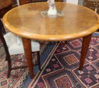 A circular burr walnut marble inset dining table, Diameter 120cm Condition: A few minor surface