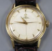 A gentleman's early 1950's 750 yellow metal Omega automatic wrist watch, with honeycomb dial with