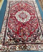 A Hamadan rug, 240 x 145cm Condition: Looks to be in good condition, fringes have been shortened