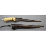 An Indian dagger pesh kabz, ivory grips, silver covered hilt and leather scabbard, late 18th