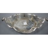 An Edwardian pieced silver oval dish, with lug handles, Mappin & Webb, London, 1905, 32.5cm, 9.