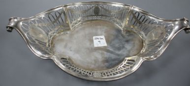 An Edwardian pieced silver oval dish, with lug handles, Mappin & Webb, London, 1905, 32.5cm, 9.