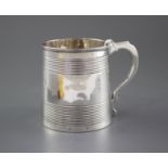 A Georgian reeded silver mug, (marks rubbed and top of handle is repaired), height 96mm, 8.5oz.