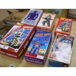 A Horikawa SH (Japan) Wind-Up New Gear Robot and five collectors' robots, including an