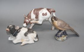 Two Royal Copenhagen figures of a bird, model 1235 and a calf, model 1072 and a Bing & Grondahl