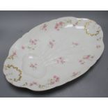 A CFH/GDM Limoges porcelain meat plate, 51cm Condition: Wear to the gilding and some wear to the