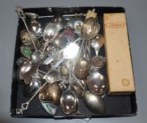 A group of assorted silver and plated spoons including souvenir. Condition: Mildly used condition,