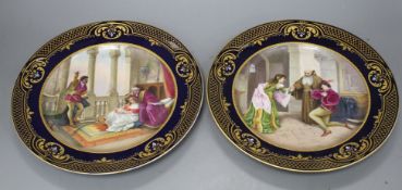 A pair of Vienna porcelain cabinet plates, decorated with Romeo und Julie, and Othello Seine