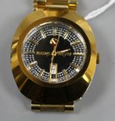 A gentleman's gilt stainless steel Rado Diastar automatic day/date wrist watch, with textured dial