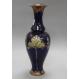 A Royal Doulton stoneware baluster vase, with floral decoration, height 42cm Condition: A little