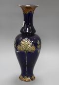 A Royal Doulton stoneware baluster vase, with floral decoration, height 42cm Condition: A little