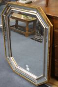 A reproduction octagonal marginal plate wall mirror, W.74cm H.94cm Condition: Good