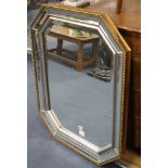 A reproduction octagonal marginal plate wall mirror, W.74cm H.94cm Condition: Good