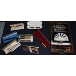 A collection of assorted pens Condition:- red cased Parker ballpoint, cap worn- black WHS tin with