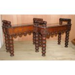 A pair of small late Victorian carved oak hall benches, W.65cm D.25cm H.50cm Condition: One bench