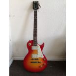 An Encore Les Paul style electric guitar Condition: Rhythm selector switch pickup is intermittent,