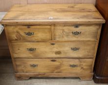 A late Victorian walnut chest of four drawers, W.94cm D.44cm H.80cm Condition: The top has a