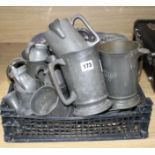 A collection of assorted pewter mugs, measures and dishes Condition:- 23.5cm plate by E. Quick of