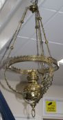 A late Victorian brass hanging oil lamp, drop 84cm Condition: Small knocks and dents from use, a