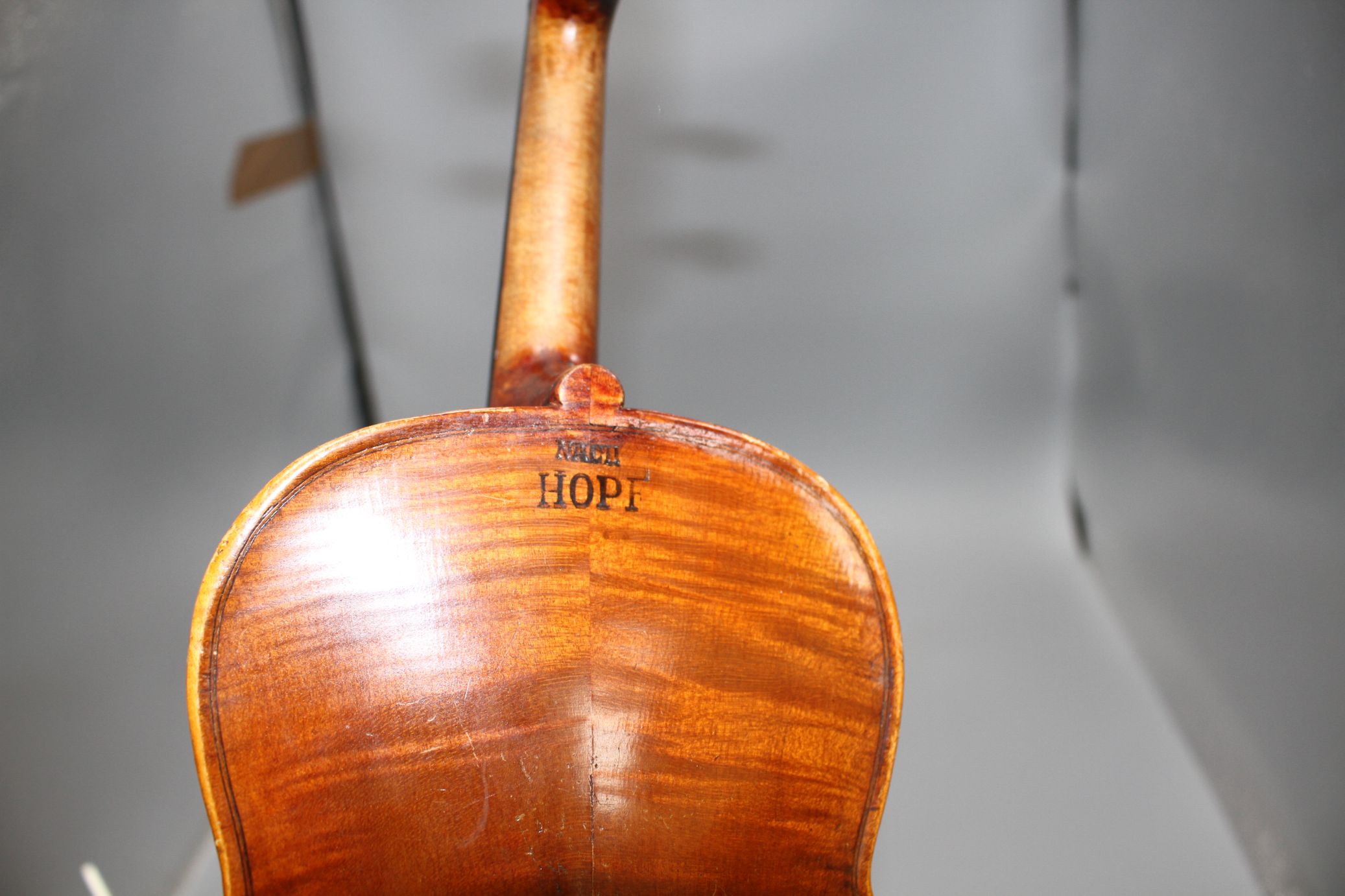 A violin with two piece back and bow, and a child's violin with bow, both with cases Condition:- - Image 44 of 44