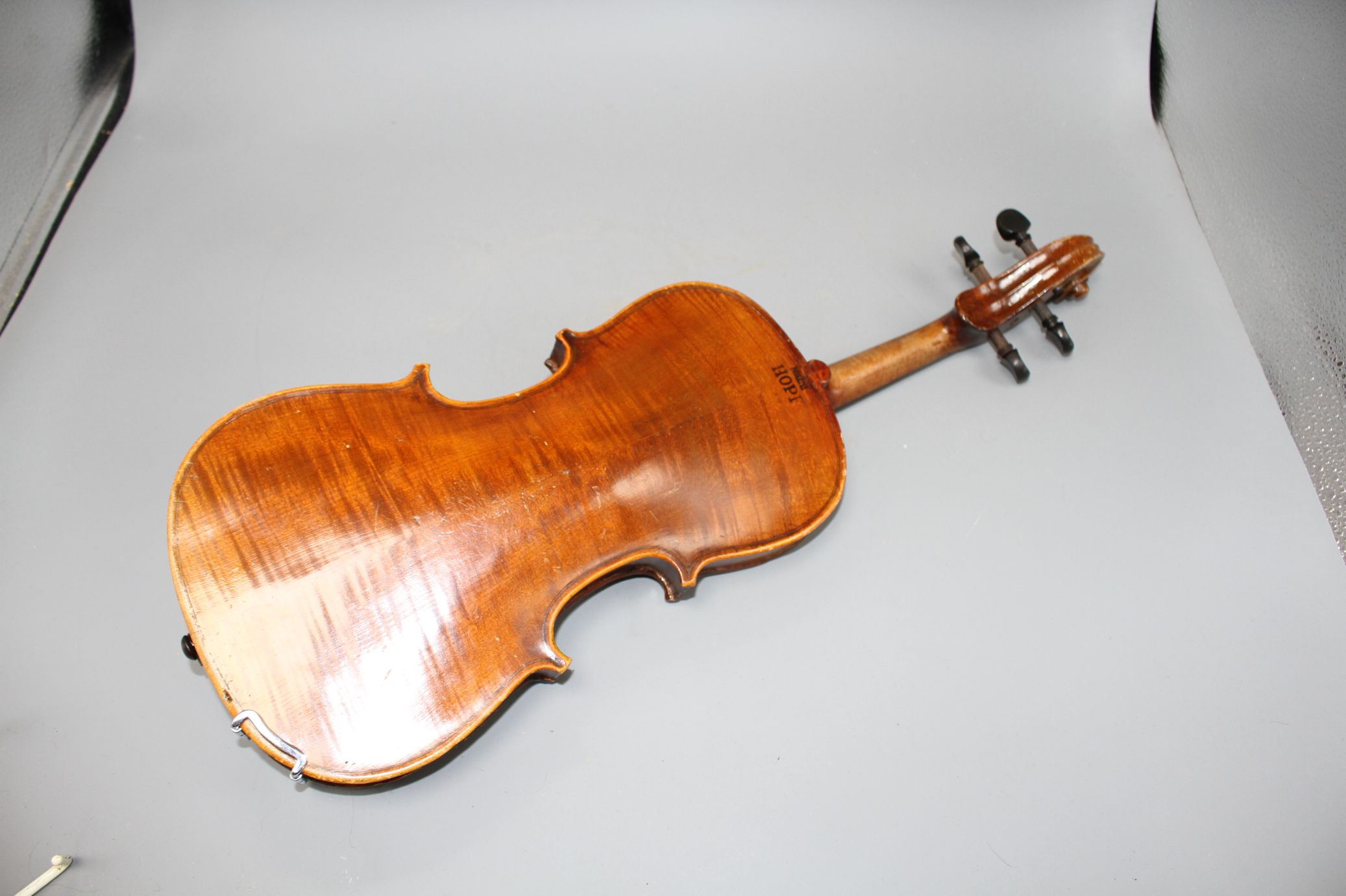 A violin with two piece back and bow, and a child's violin with bow, both with cases Condition:- - Image 24 of 44