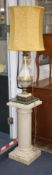 A pair of Venetian style brass mounted jewelled glass table lamps, on reconstituted marble