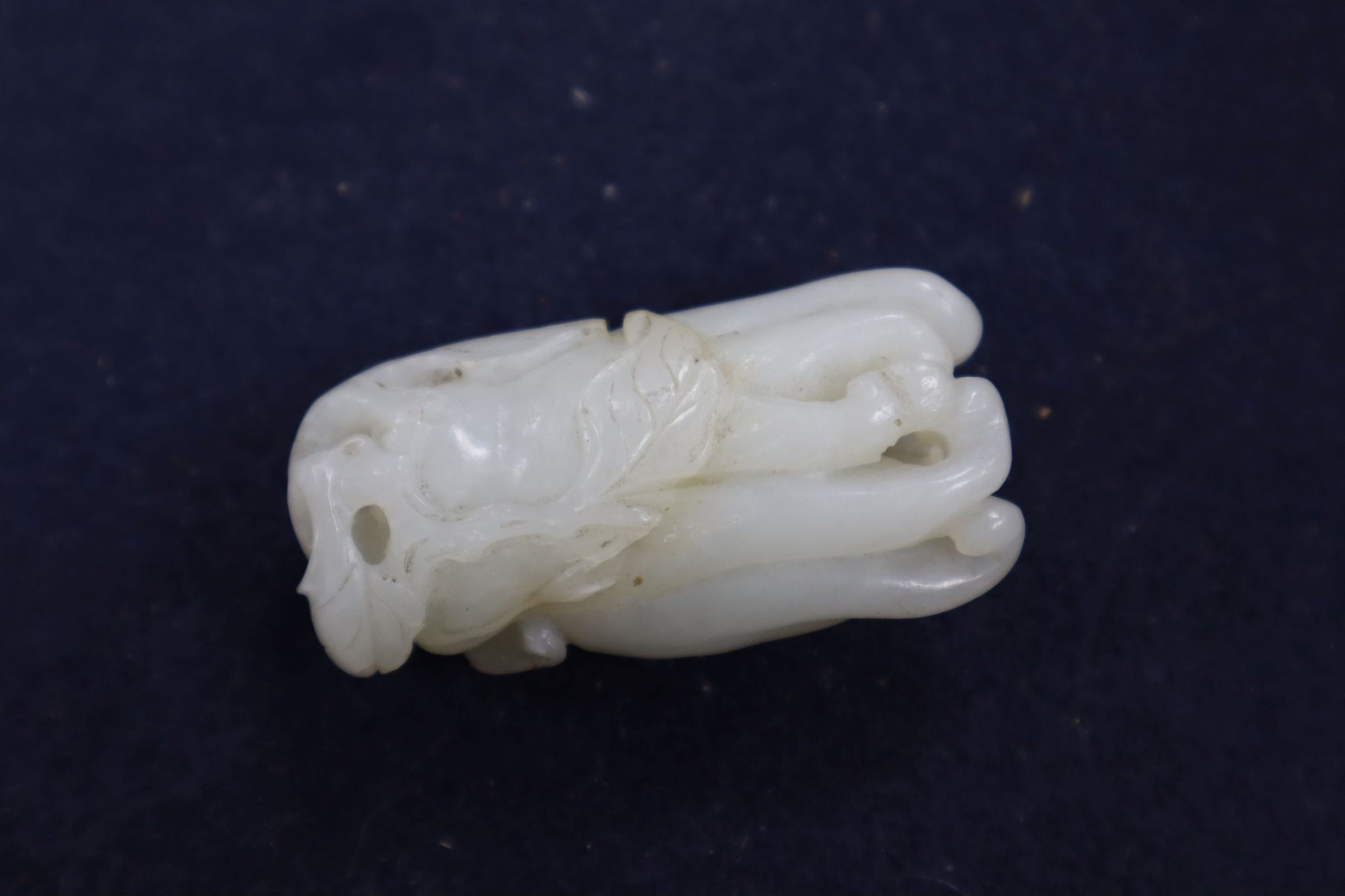 A Chinese jade carving of a finger citron, length 5.5cm, width 2.5cm, depth 2cm Condition: some - Image 6 of 11