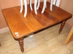 A late Victorian mahogany extending dining table, L.150cm (inc. spare