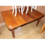 A late Victorian mahogany extending dining table, L.150cm (inc. spare