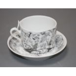 A Fornasetti Ginori 'High Fidelity' cup and saucer, decorated with cats, saucer 13.5cm, cup height