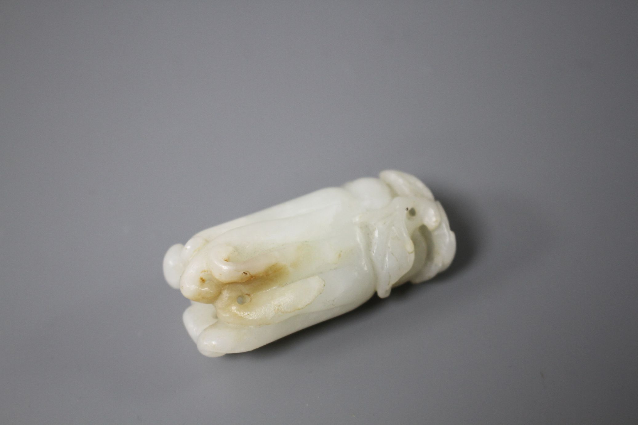 A Chinese jade carving of a finger citron, length 5.5cm, width 2.5cm, depth 2cm Condition: some - Image 3 of 11