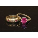 An early 20th century 18ct gold and gypsy set ruby and diamond three stone ring, size O, gross 1.9