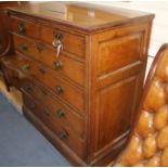 A 19th century panelled oak chest of drawers, W.103cm D.56cm H.112cm Condition: The top has two